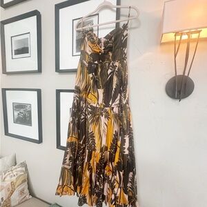 Karina Grimaldi olive green and yellow tropical strapless dress.